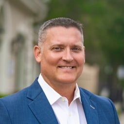 Headshot of Jamie Brown, EVP, Divisional President, Lower