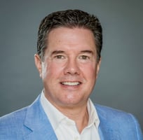 Headshot of Nino Saso, EVP, Divisional President, Lower
