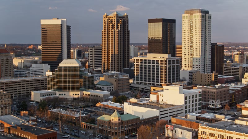 Aerial view of the downtown Birmingham, Alabama skyline in golden sunset light