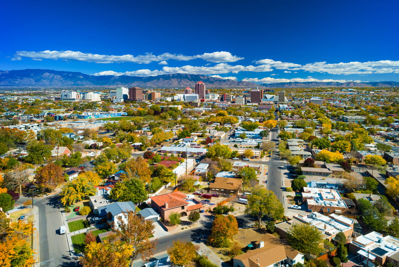 Albuquerque, New Mexico skyline with neighborhoods and mountains