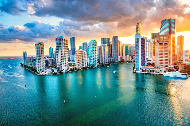 Miami, Florida skyline along Biscayne Bay at sunset