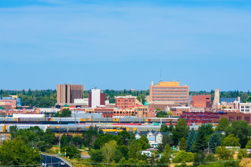 Downtown Cheyenne, Wyoming skyline with train cars in the foreground