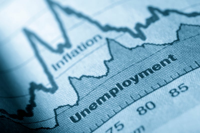 An inflation and unemployment graph in a newspaper.