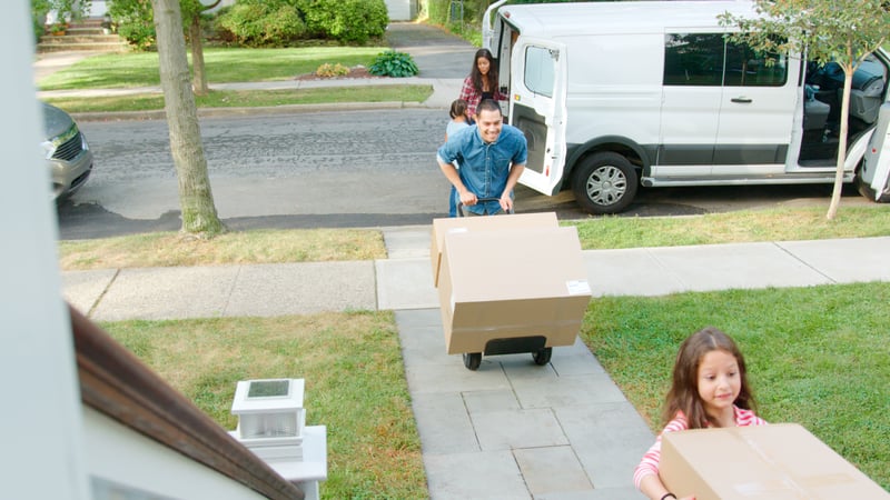 A family moves into a new home.