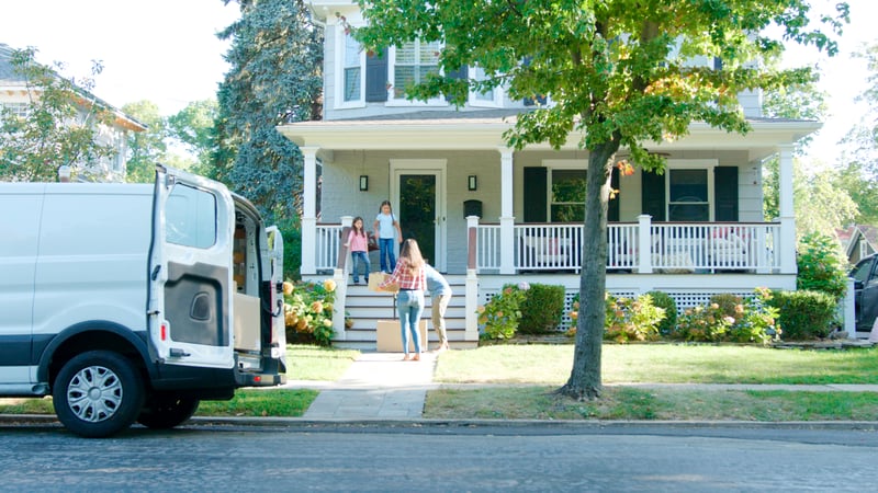A family moves into a new home.