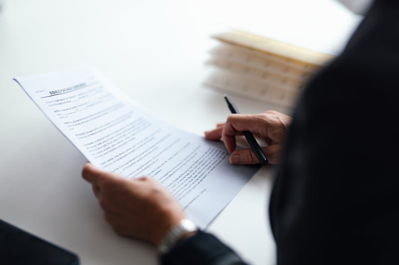 A person looks over a home appraisal.