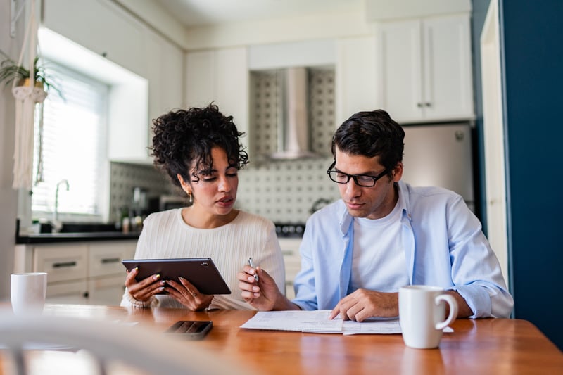 Homeowners compare refinance and recasting options for their current mortgage.