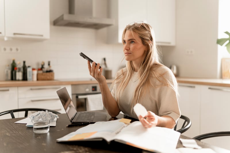 A woman calculates how much home she can afford.