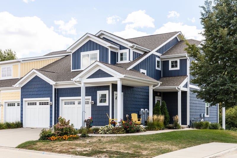 A blue suburban triplex.