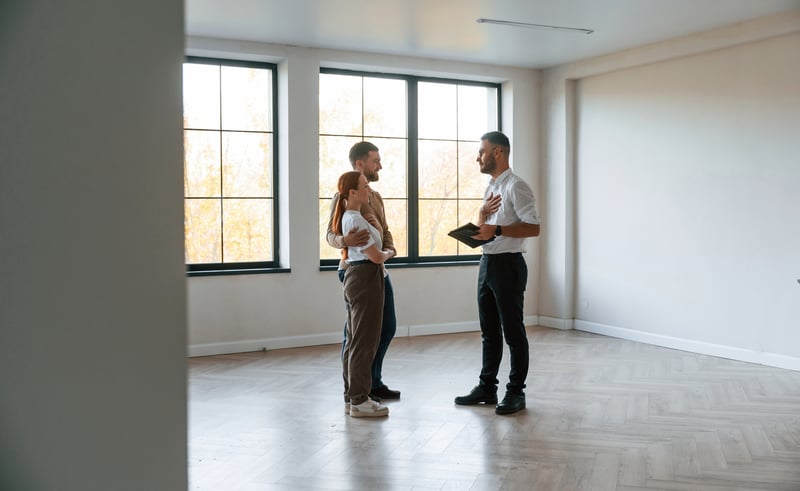 People tour a new house.