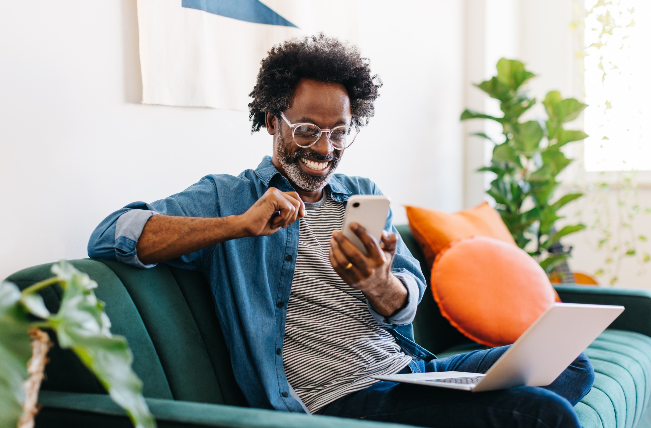 A man smiles while exploring asset qualifier loan options.